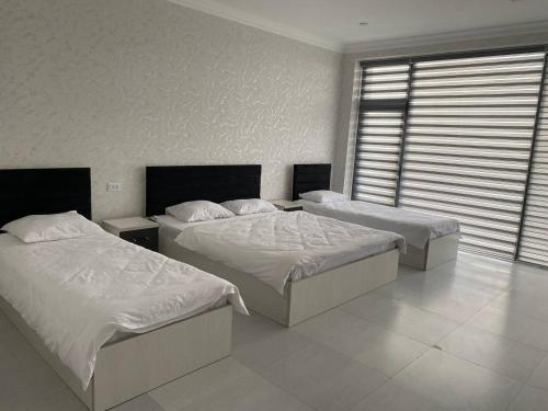 Imagen de la habitación del ERA Hotel Urganch. Foto 19