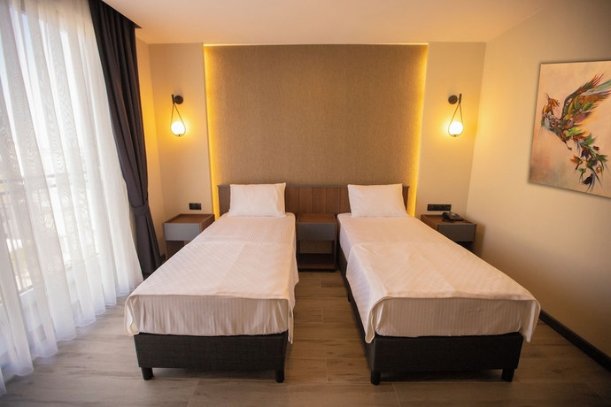 Imagen de la habitación del EVDİRHAN OTEL. Foto 5