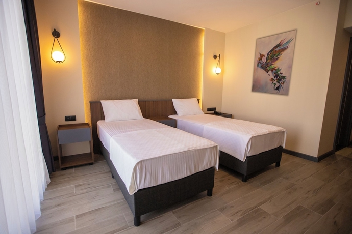 Imagen de la habitación del EVDİRHAN OTEL. Foto 11