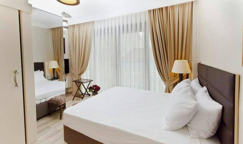 Imagen de la habitación del EVODA HOTEL. Foto 12