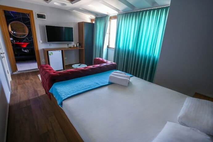 Imagen de la habitación del Eagle Palace Suites. Foto 15