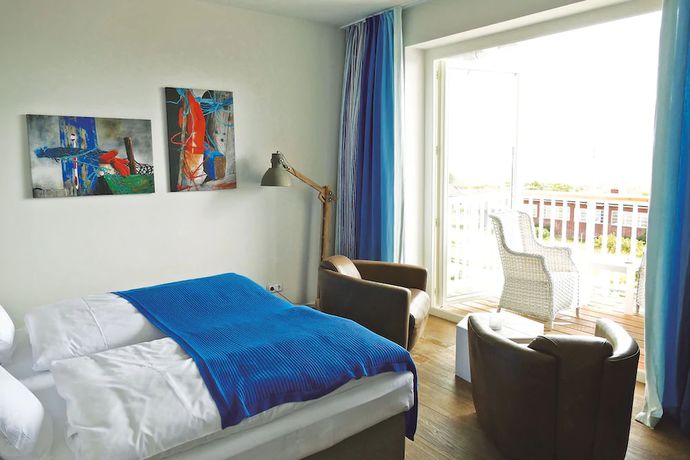 Imagen de la habitación del Easy Living Hotel. Foto 13