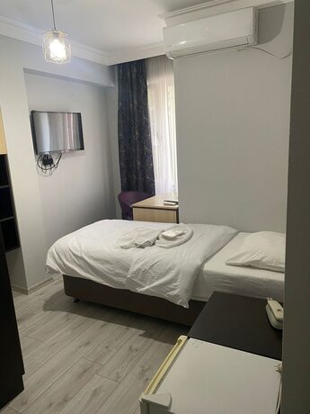 Imagen de la habitación del Ece Han Butik Otel, Atakum. Foto 13