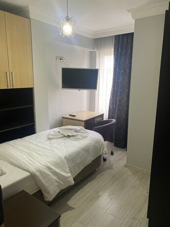 Imagen de la habitación del Ece Han Butik Otel, Atakum. Foto 14