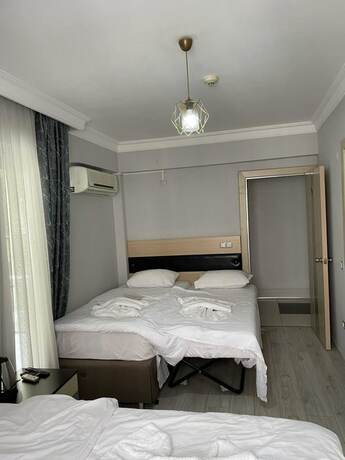 Imagen de la habitación del Ece Han Butik Otel, Atakum. Foto 15