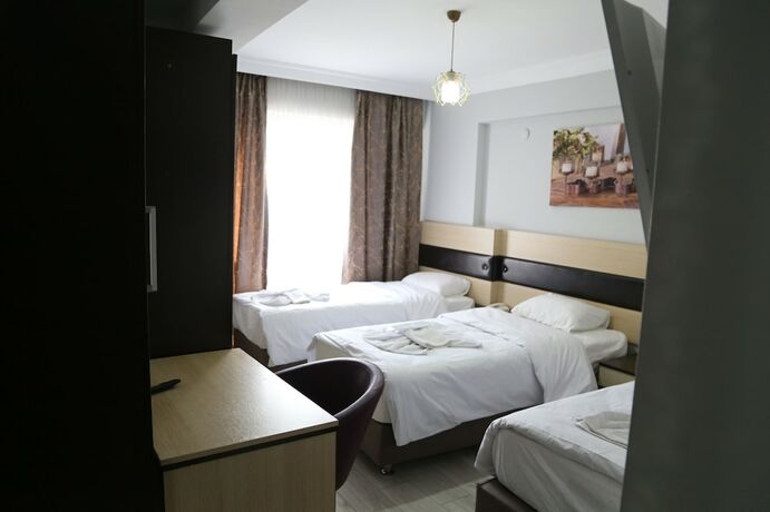 Imagen de la habitación del Ece Han Butik Otel, Atakum. Foto 19