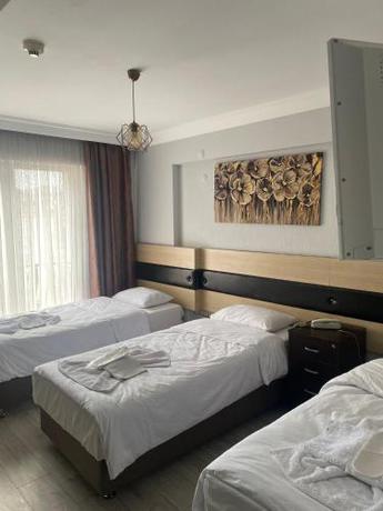 Imagen de la habitación del Ece Han Butik Otel, Atakum. Foto 17