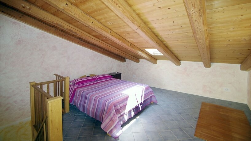 Imagen de la habitación del EcoBelmonte Albergo Diffuso. Foto 11