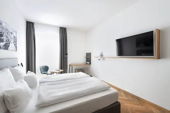 Imagen de la habitación del Ecome Hotel. Foto 9