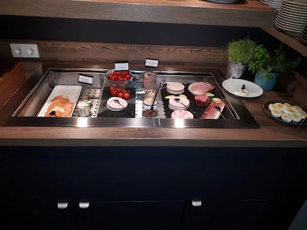 Imagen del bar/restaurante del Ecome Hotel. Foto 2