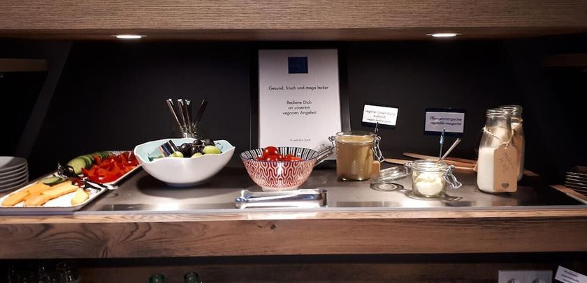 Imagen del bar/restaurante del Ecome Hotel. Foto 3