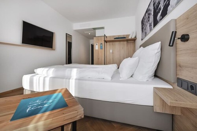 Imagen de la habitación del Ecome Hotel. Foto 10