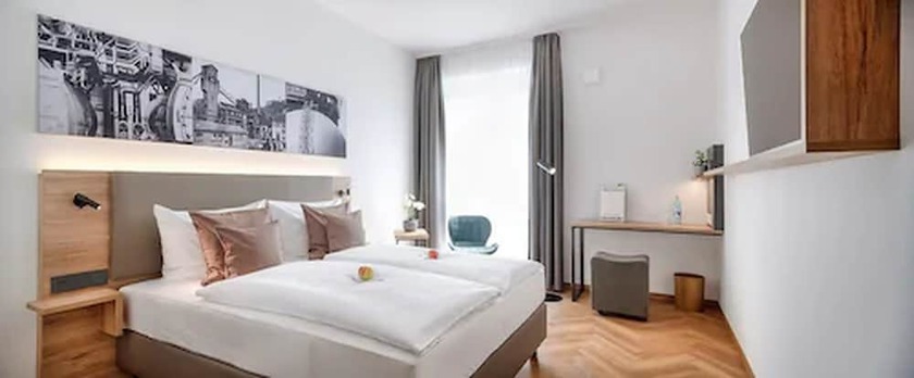 Imagen de la habitación del Ecome Hotel. Foto 12