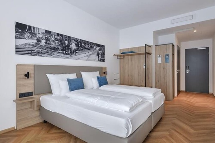 Imagen de la habitación del Ecome Hotel. Foto 13