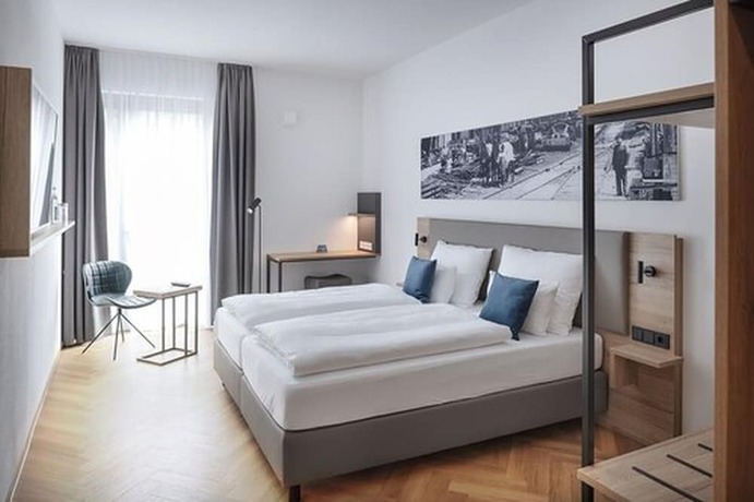 Imagen de la habitación del Ecome Hotel. Foto 14