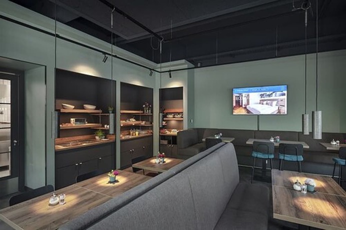 Imagen del bar/restaurante del Ecome Hotel. Foto 5