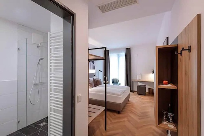 Imagen de la habitación del Ecome Hotel. Foto 15