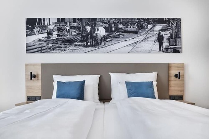 Imagen de la habitación del Ecome Hotel. Foto 18