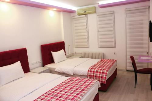 Imagen de la habitación del Ecs Suw Hotel. Foto 8