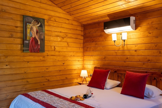 Imagen de la habitación del Eden Bungalows and Beach. Foto 12