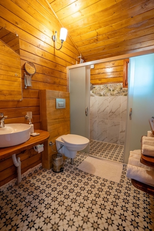 Imagen de la habitación del Eden Bungalows and Beach. Foto 19