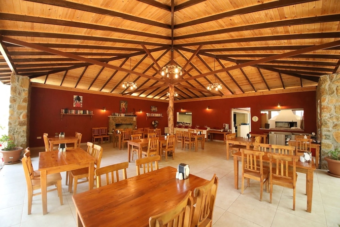 Imagen del bar/restaurante del Eden Bungalows and Beach. Foto 3