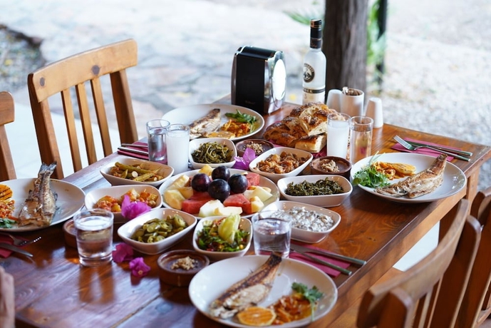 Imagen del bar/restaurante del Eden Bungalows and Beach. Foto 5