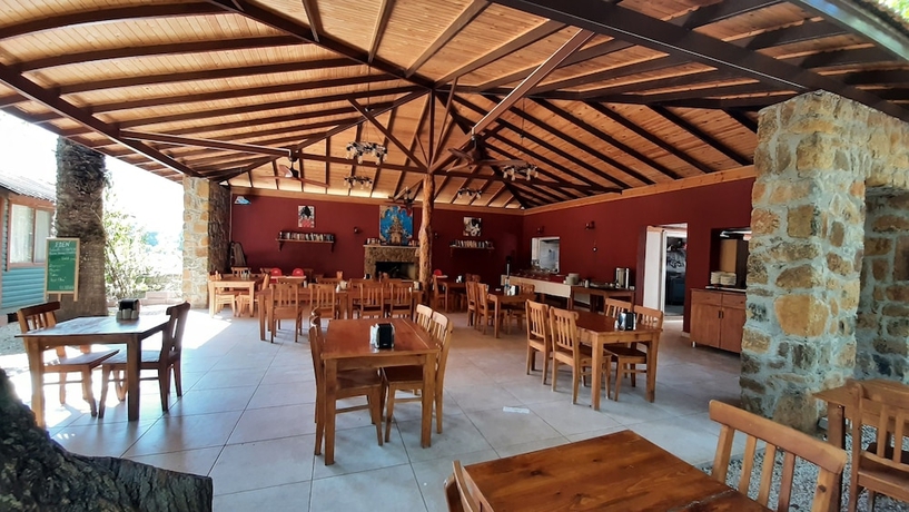 Imagen del bar/restaurante del Eden Bungalows and Beach. Foto 7