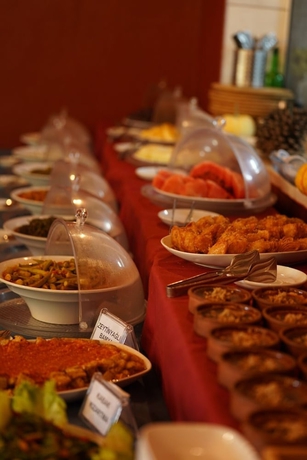 Imagen del bar/restaurante del Eden Bungalows and Beach. Foto 9