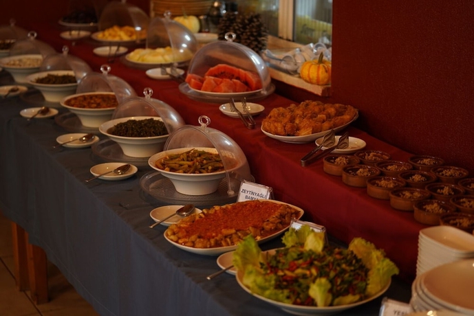 Imagen del bar/restaurante del Eden Bungalows and Beach. Foto 10