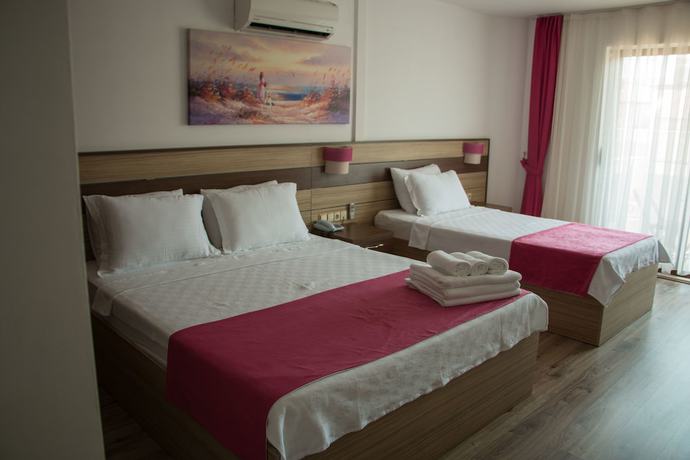 Imagen de la habitación del Eden Pyara Hotel Turunc. Foto 3