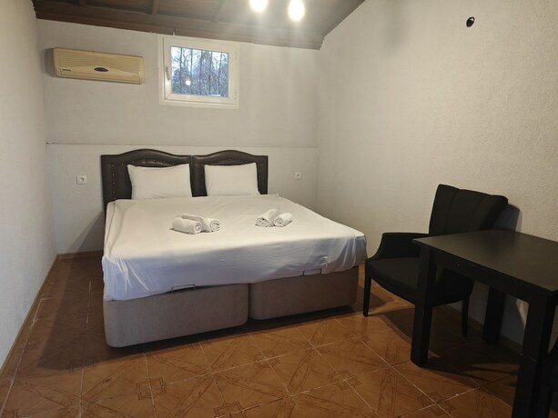 Imagen de la habitación del Efes Hidden Garden Resort Otel. Foto 18