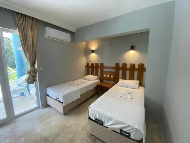 Imagen de la habitación del Ege Apart Hotel. Foto 19