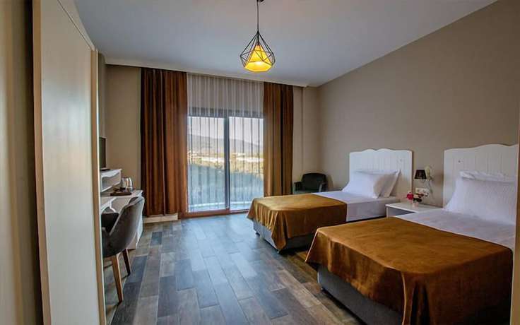 Imagen de la habitación del Elaia Thermal and Spa Hotel. Foto 7