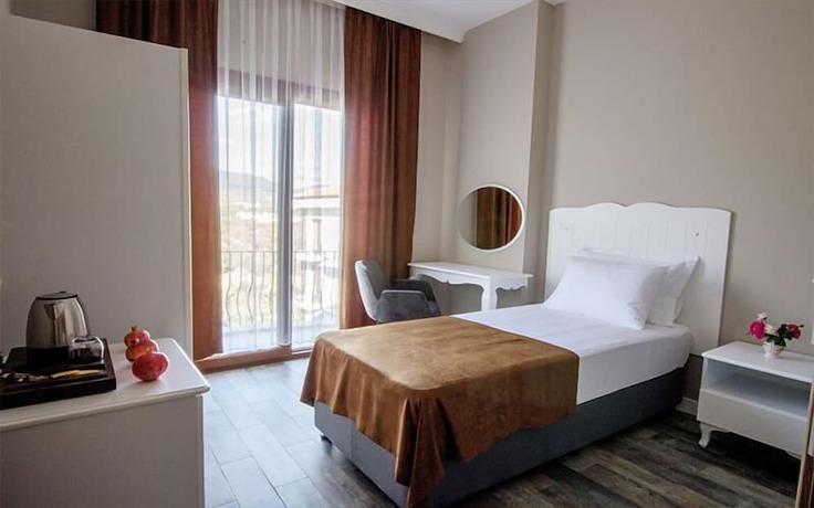 Imagen de la habitación del Elaia Thermal and Spa Hotel. Foto 12