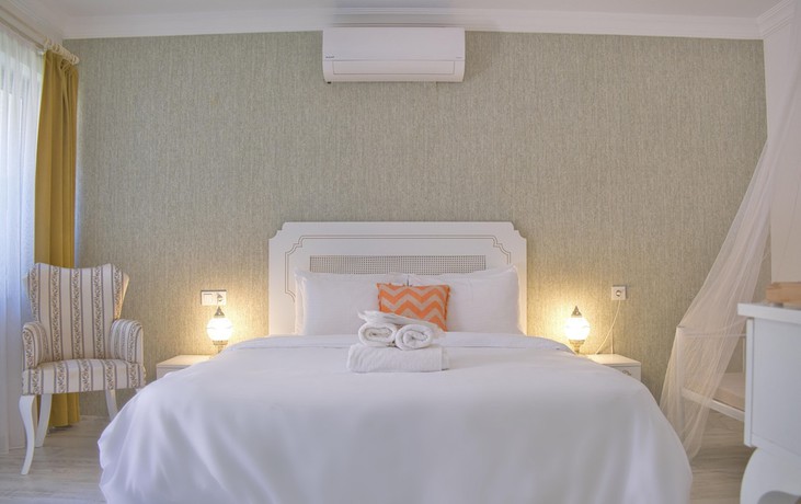 Imagen de la habitación del Elda Alacati Boutique Hotel. Foto 8