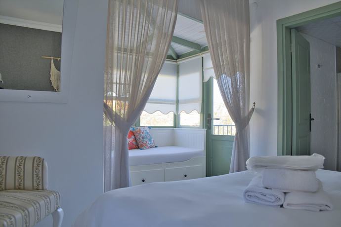 Imagen de la habitación del Elda Alacati Boutique Hotel. Foto 12