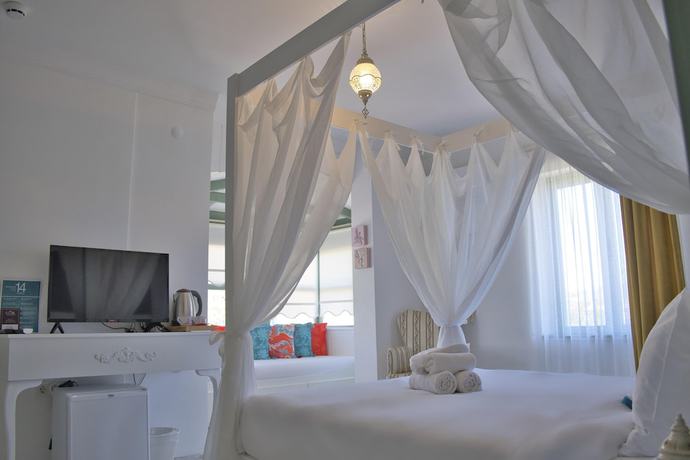 Imagen de la habitación del Elda Alacati Boutique Hotel. Foto 13