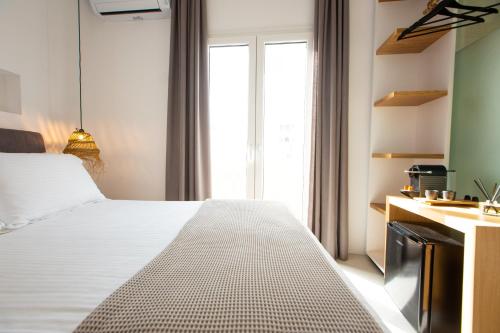 Imagen de la habitación del Eleana Hotel. Foto 19