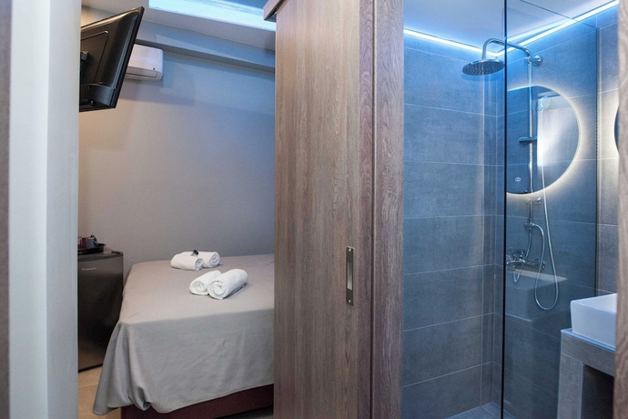 Imagen de la habitación del Elegant Rooms Athens. Foto 9