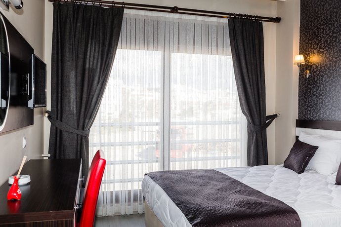 Imagen de la habitación del Eleven Hotel. Foto 7