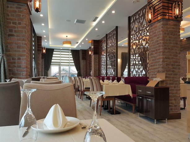 Imagen del bar/restaurante del Elgarden Hotel And Residence. Foto 7