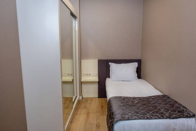 Imagen de la habitación del Elm Suite Hotel. Foto 2