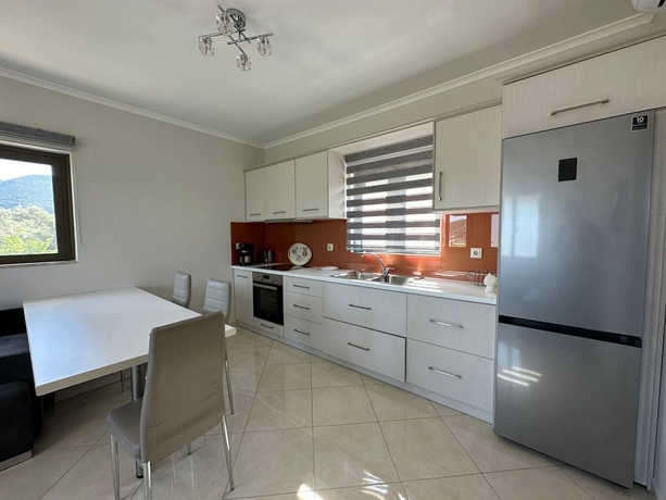 Imagen de la habitación del Elpida Luxury Apartments and Suites. Foto 12