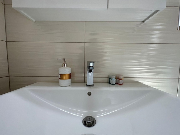 Imagen de la habitación del Elpida Luxury Apartments and Suites. Foto 13