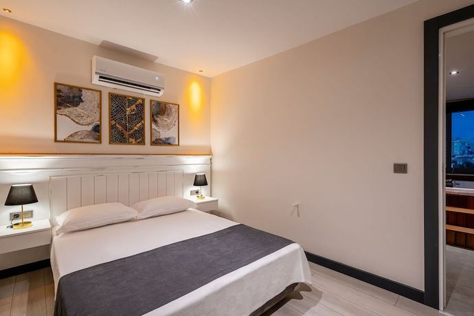 Imagen de la habitación del Eluxio Suite Hotel. Foto 3
