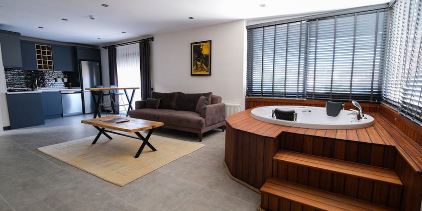 Imagen de la habitación del Eluxio Suite Hotel. Foto 6