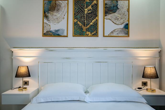 Imagen de la habitación del Eluxio Suite Hotel. Foto 9