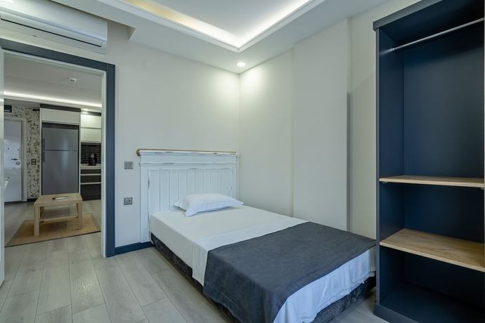 Imagen de la habitación del Eluxio Suite Hotel. Foto 10