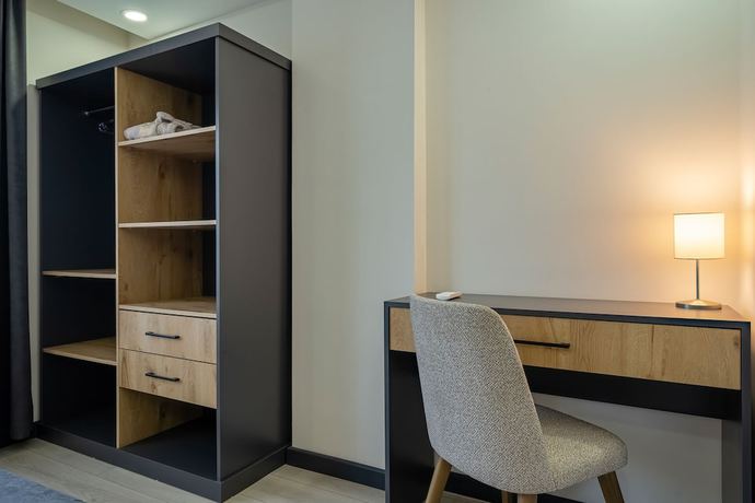 Imagen de la habitación del Eluxio Suite Hotel. Foto 15